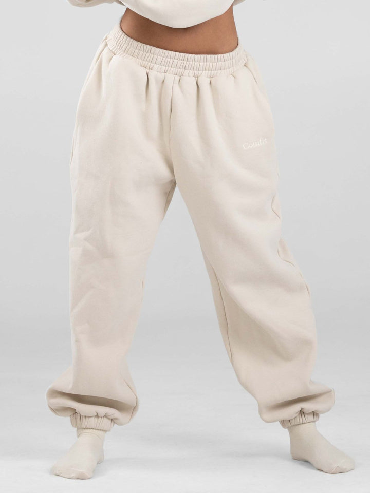 Women's casual sweatpants with high waistband, side pockets and elastic cuffs Mune Fashion