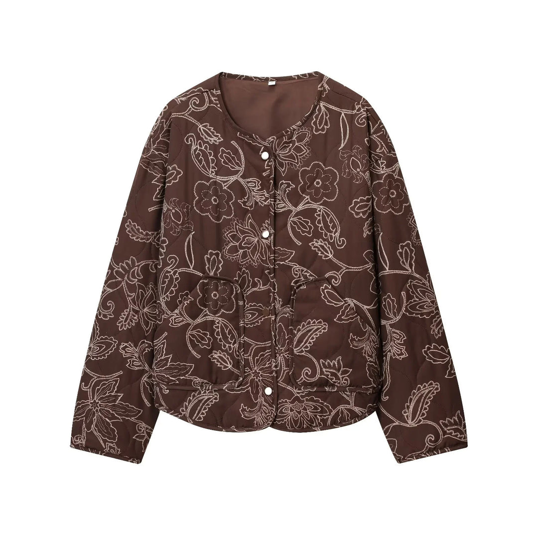Women's padded short jacket with floral quilting pattern, snap button front and waist drawstring Mune Fashion