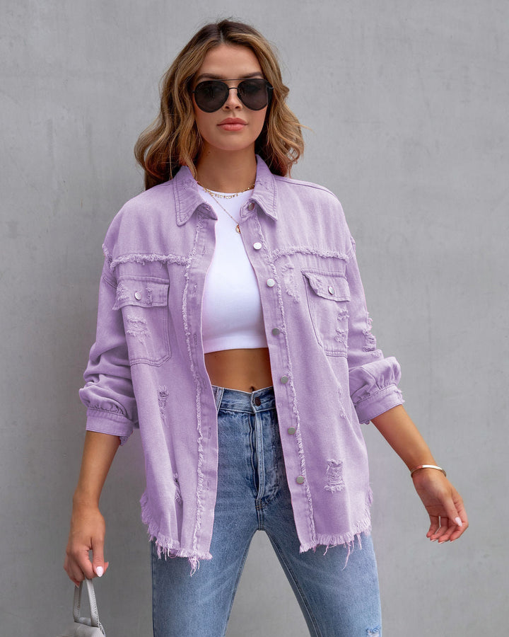 Women's oversized utility denim shirt jacket with fringe trim and patch pockets Mune Fashion