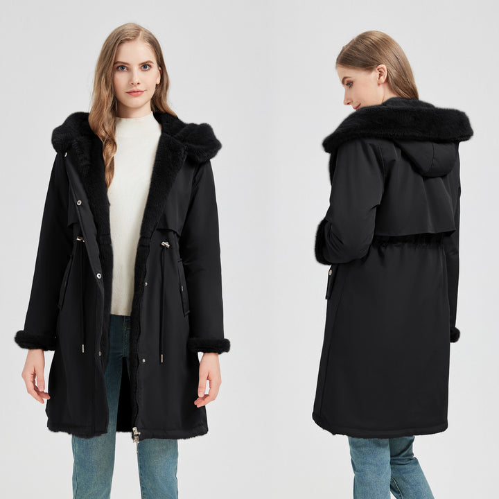 Women's tailored long thermal parka with faux fur trim on hood and sleeves as well as drawstring waist Mune Fashion