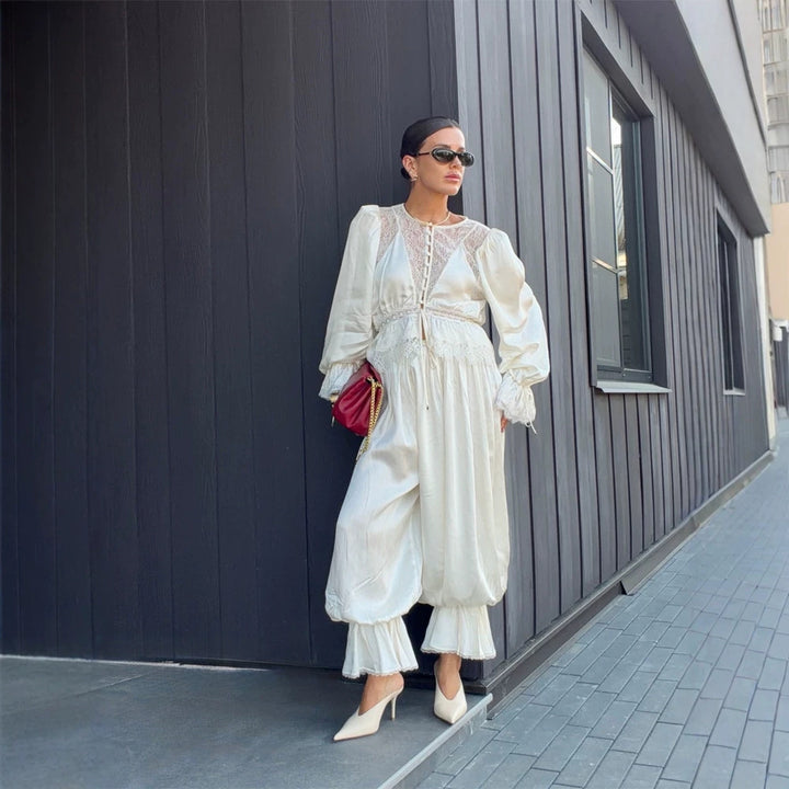 Women's One-Piece Satin Jumpsuit with Lace Yoke, Puff Sleeves and Voluminous Harem Pants Mune Fashion