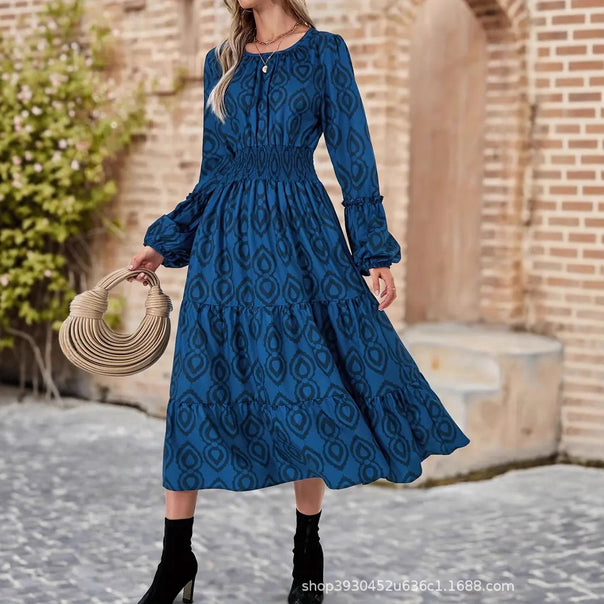 Women's midi dress with elastic smocked waistband, tiered skirt and trumpet sleeves Mune Fashion