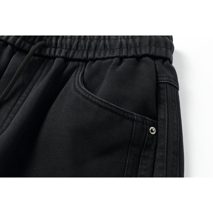 Women's wide high-waisted jeans with elastic waistband, drawstring, and decorative seams Mune Fashion