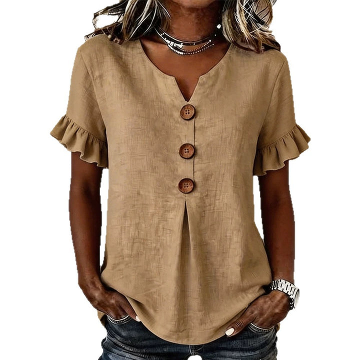 Women's top with ruffled hems and button details Mune Fashion