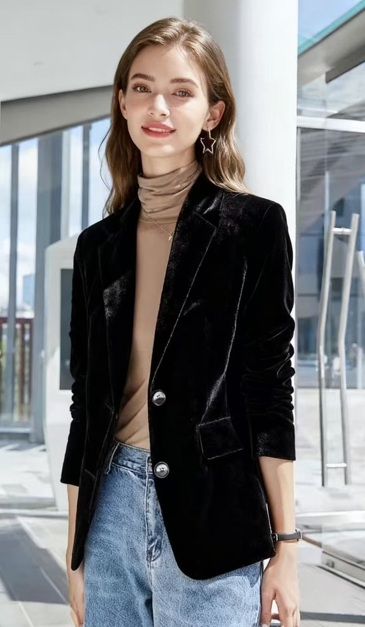 Women's narrow-cut velvet blazer with extended hem, flap pockets, and polished buttons Mune Fashion