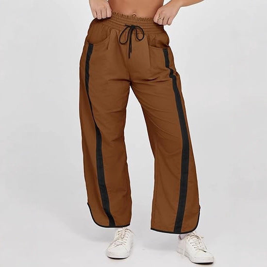 Women's nan relaxed track pants with side contrast stripe, elastic smocked waistband, and side pockets Mune Fashion