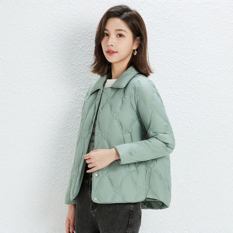 Women Short Cut Quilted Jacket with Decorative Stitching and Rounded Hem Mune Fashion