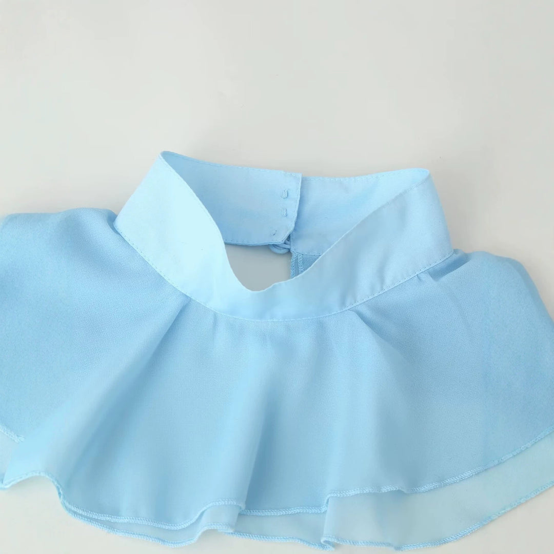 Ladies ruffle blouse with stand-up collar, ruffle details and waist belt Mune Fashion