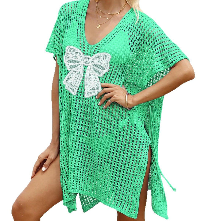 Ladies airy crochet beach cover-up with decorative bows
