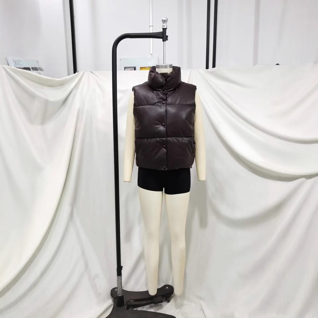 Ladies nan padded faux leather vest with high stand-up collar, snap button placket and waist drawstring Mune Fashion
