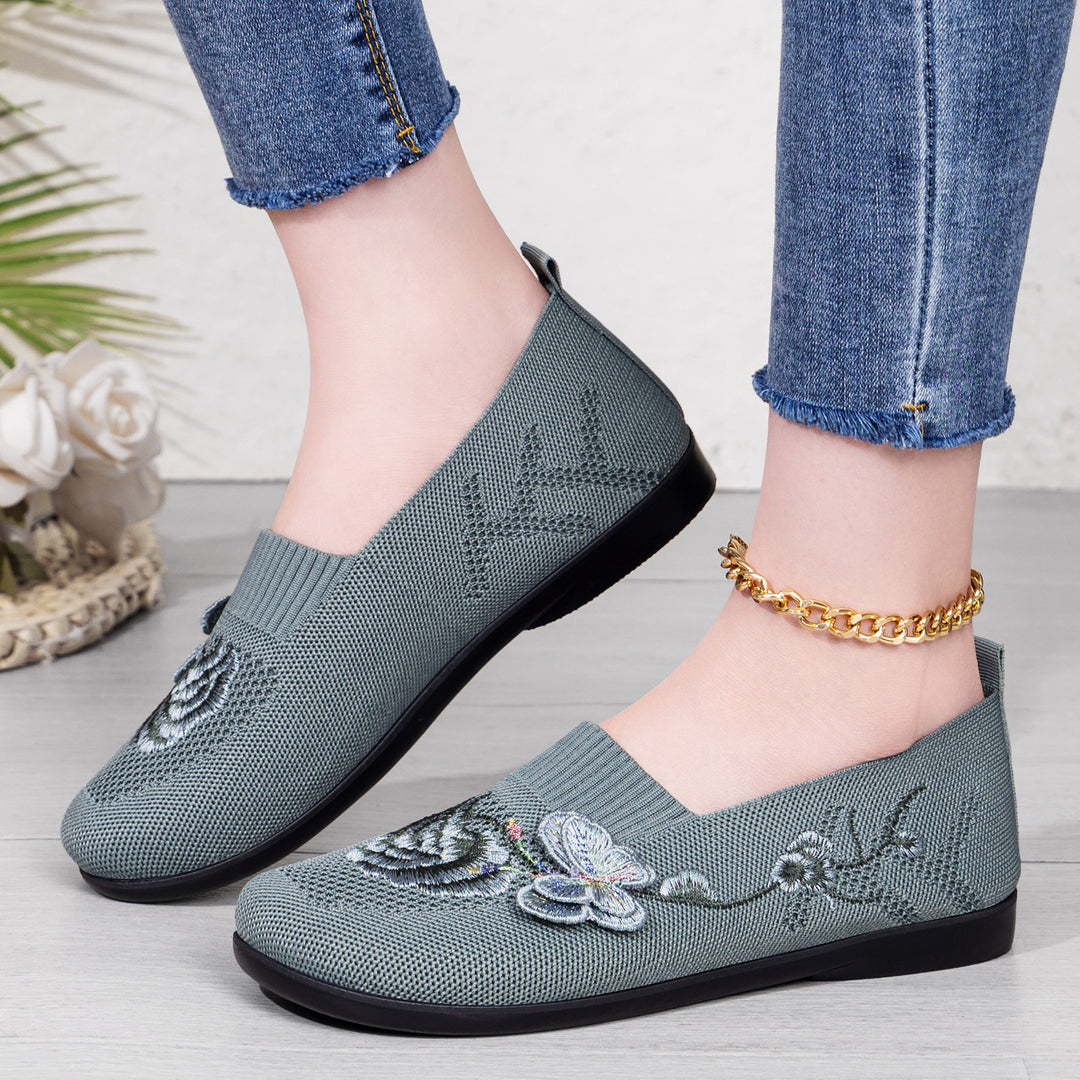 Women's embroidered knitted slipper with sock-like entry, floral embroidery design, and cushioned lightweight sole Mune Fashion