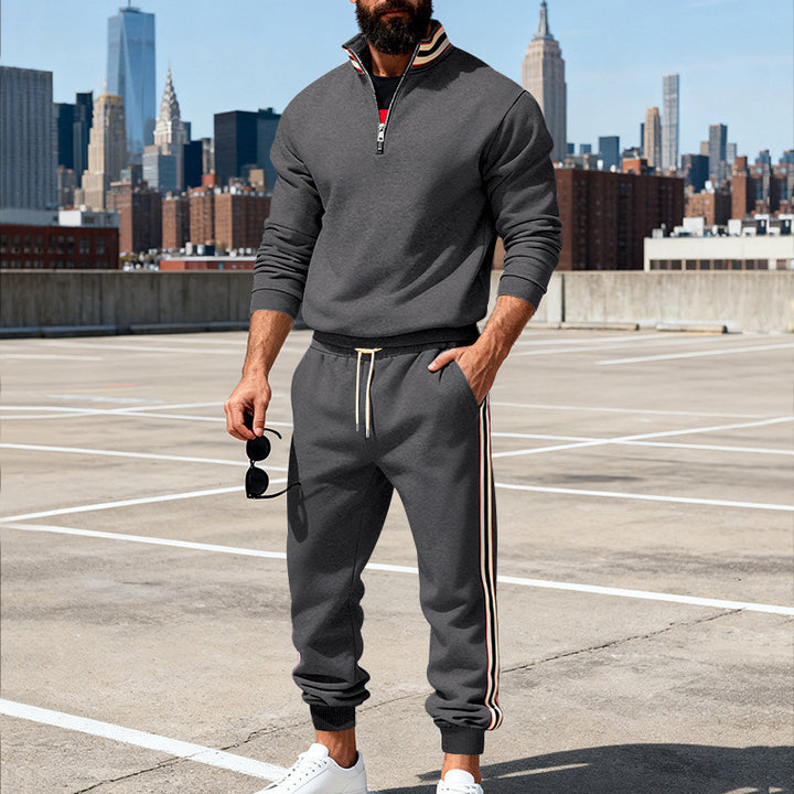 Men's stylish tracksuit set with half-zip, striped side stripes, and tapered jogger pants Mune Fashion