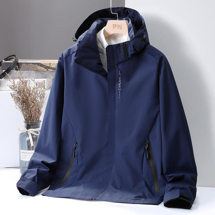 Women's Lightweight Softshell Hooded Jacket with Windproof Storm Flap and Concealed Zipper Pockets Mune Fashion