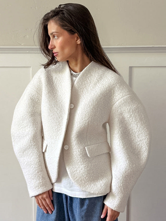 Ladies short jacket in boucle style with oversized sleeves and flap pockets Mune Fashion