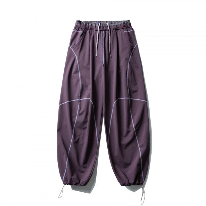 Unisex locker cut tech jogging pants with elastic waistband, distinctive flatlock seams and drawstring Mune Fashion