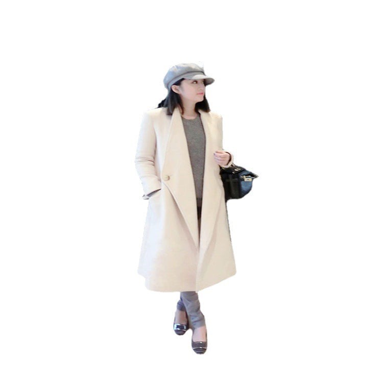 Women's midi-length tailored wool blend long coat with shawl collar, inset pockets, and discreet decorative buttons Mune Fashion