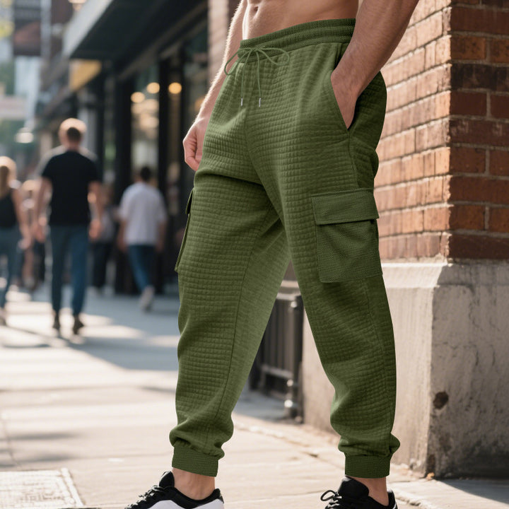 Men's quilted thermo lounge pants with functional pockets, drawstring and elastic waistband Mune Fashion