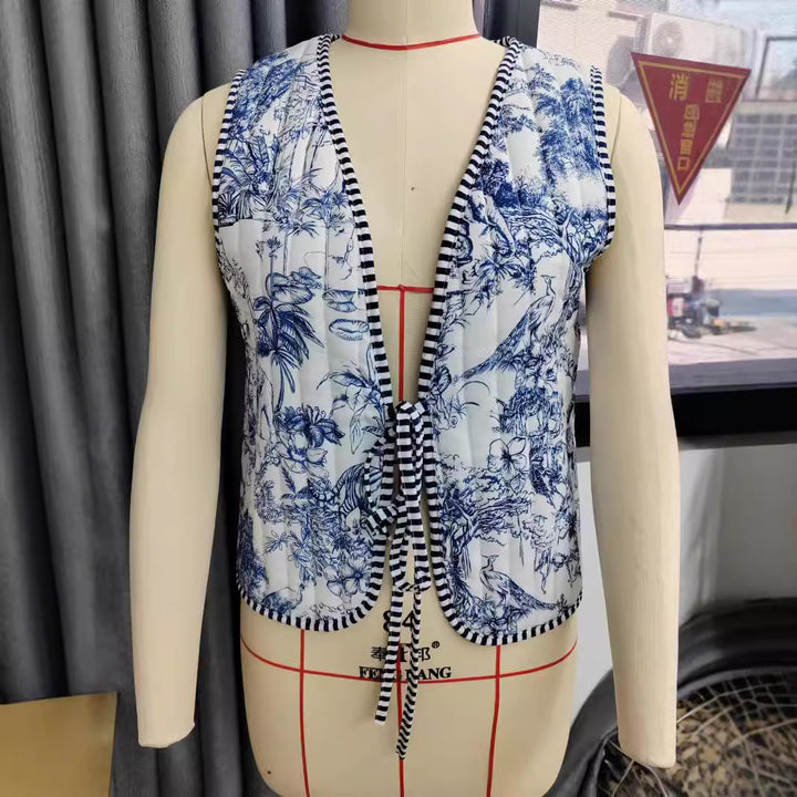 Ladies patchwork vest with tie belt, striped interior finish and contrast piping Mune Fashion
