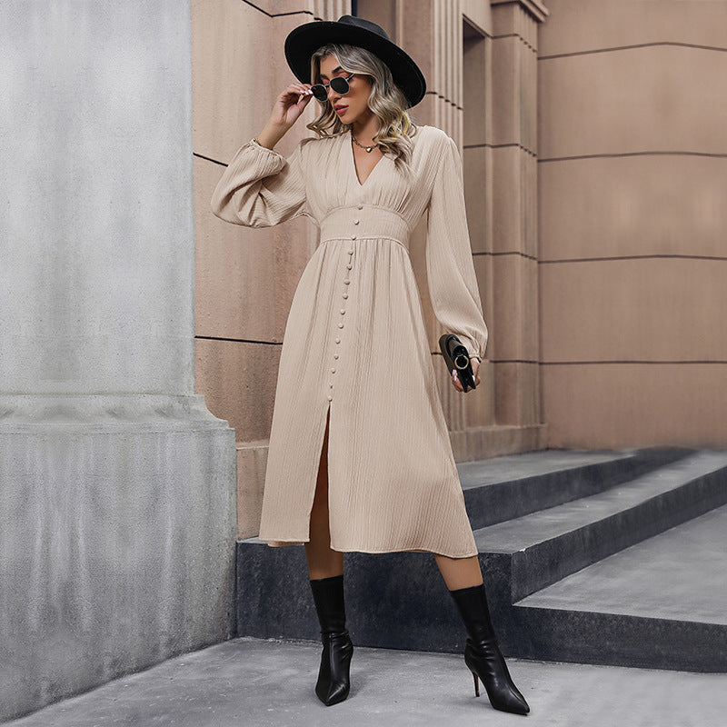 Women's midi dress with V-neck, pleated crinkle look, fitted yoke & central button placket Mune Fashion