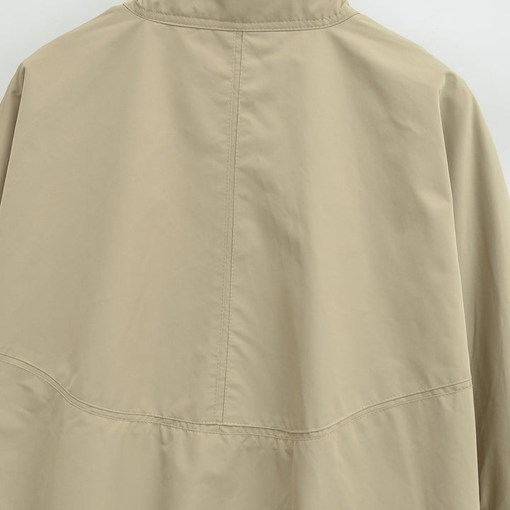 Women's Lightweight Rain and Wind Jacket with Stand Collar, Concealed Zipper and Elastic Hem Mune Fashion