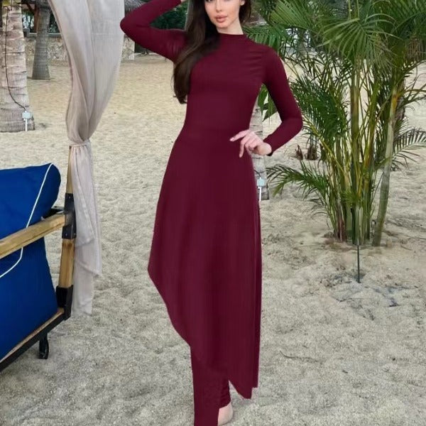 Ladies elegant beach suit with asymmetrical cut and long sleeves Mune Fashion