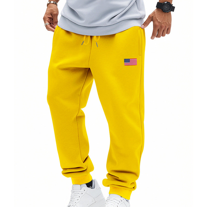 Men's trendy joggers with elastic drawstring waistband, ribbed cuffs, and discreet flag application Mune Fashion