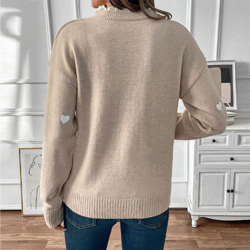 Women's V-neck fine knit sweater with heart intarsia and ribbed cuffs Mune Fashion