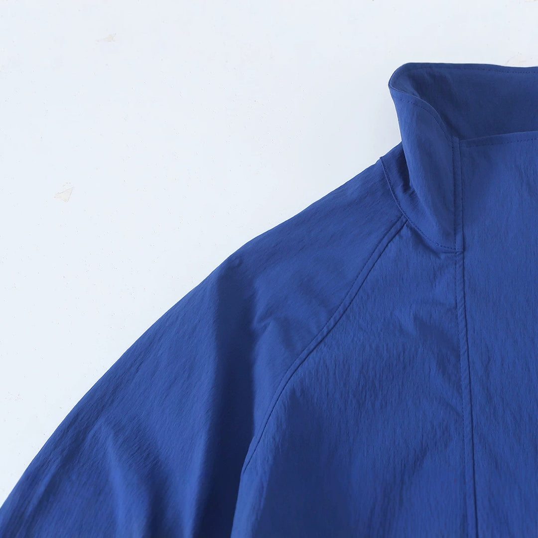 Women's Light Cropped Transition Jacket with Stand-Up Collar, Wide Raglan Sleeves and Drawstring Mune Fashion
