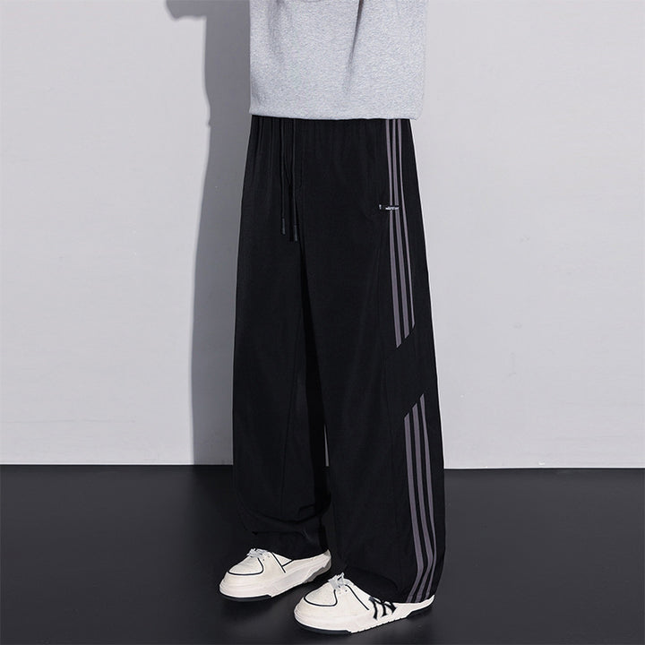 Men's sporty leisure pants with side stripes Mune Fashion