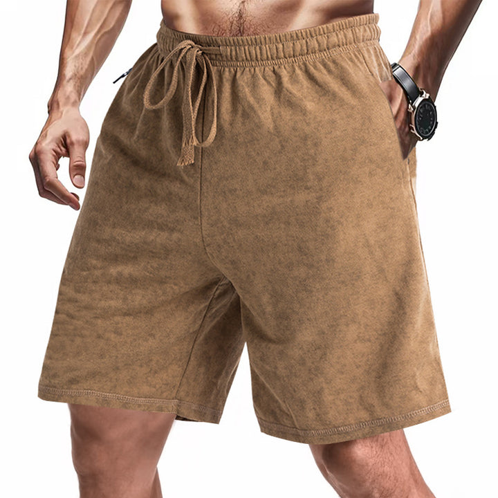 Men's lightly fitted terry shorts with elastic waistband, drawstring and side pockets Mune Fashion