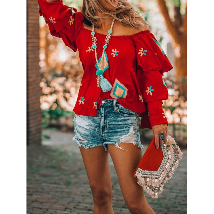 Women's Boho top with off-the-shoulder neckline, layered flounce sleeves, and elaborate embroidery Mune Fashion