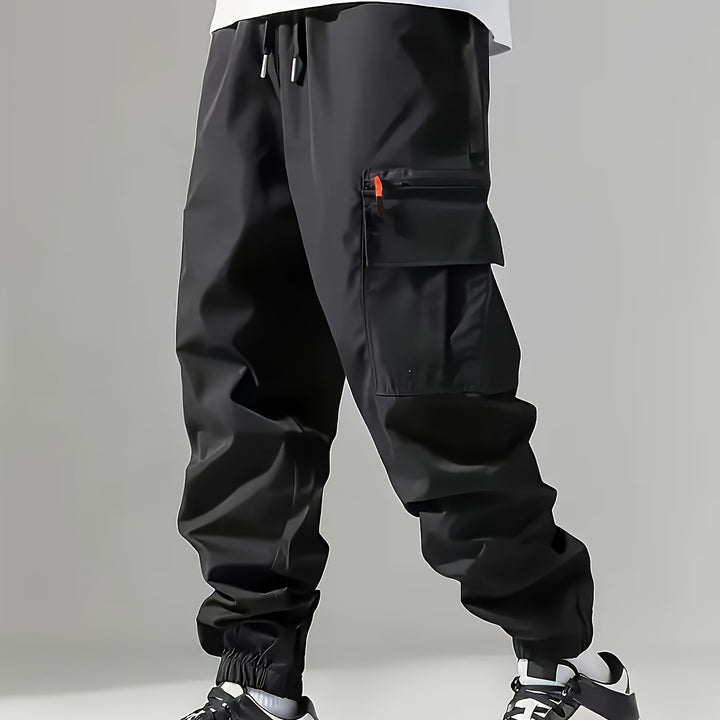 Men's cargo jogging pants in utility style with sealed zipper pocket & elastic leg cuffs Mune Fashion