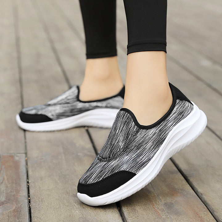 Women's elegant slip-on sneakers with elastic decorative straps, breathable knit construction and cushioned comfort sole Mune Fashion