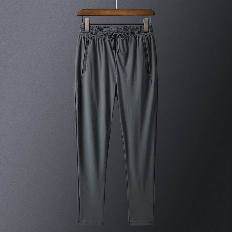 Men's sporty training pants with practical zip pockets Mune Fashion