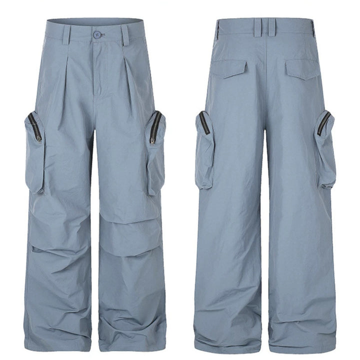 Women wide-cut cargo palazzo pants with high waist, zip pockets and layered panels Mune Fashion