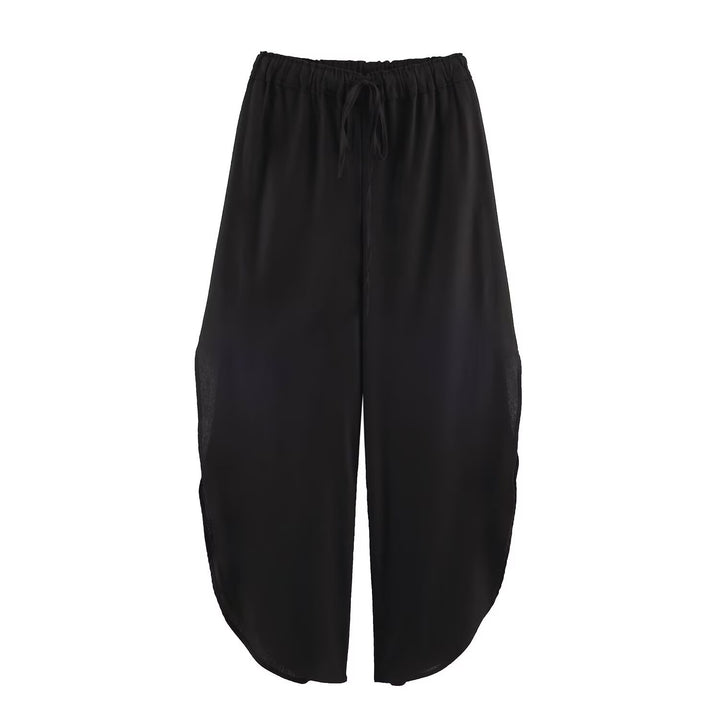 Ladies loose-fitting harem pants with drawstring waistband, mid-slit, and rounded hem Mune Fashion