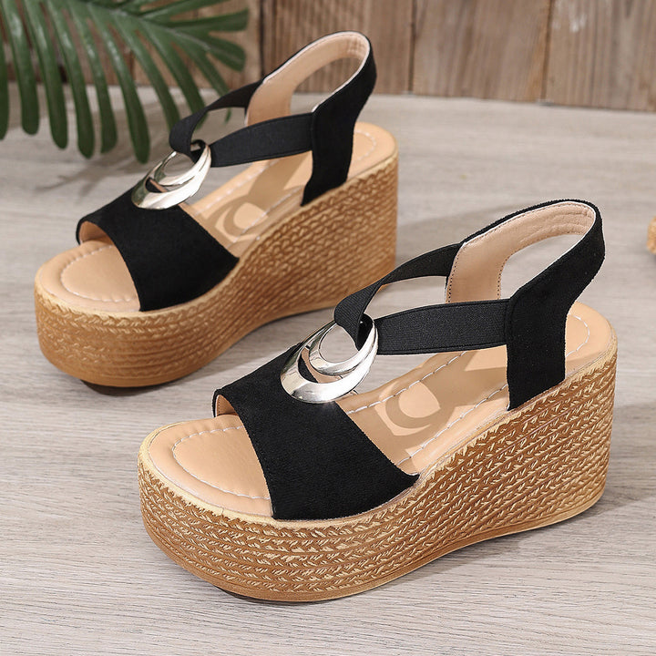 Women's retro-style wedge sandals with jute look, decorative metal ornament, and elastic heel strap Mune Fashion
