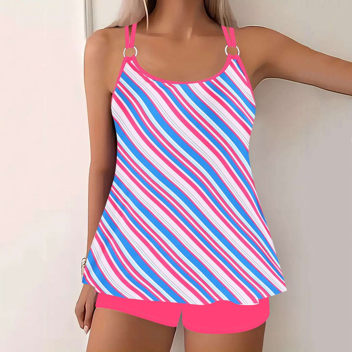 Ladies airy-cut spaghetti strap top with ring detail and A-line cut Mune Fashion