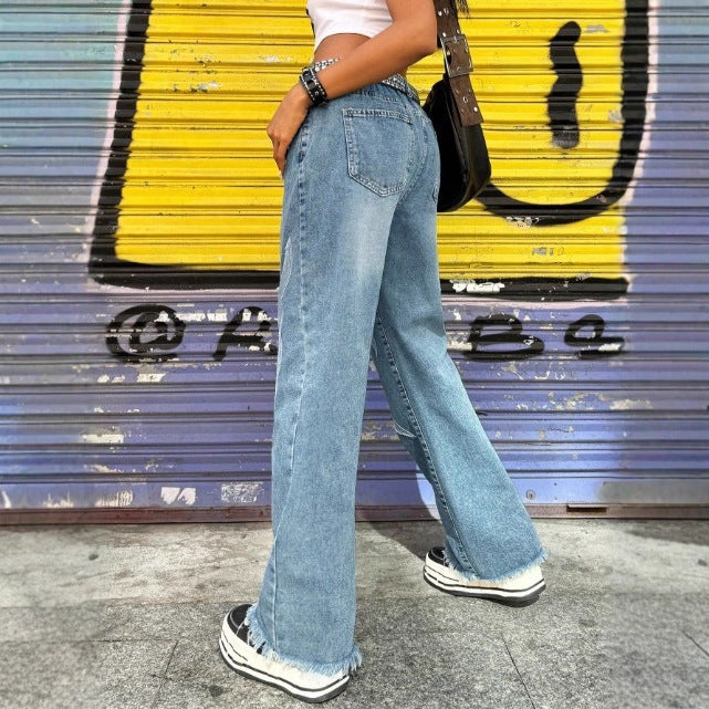 Women wide denim jeans with tribal appliqué, raw hem and relaxed fit Mune Fashion