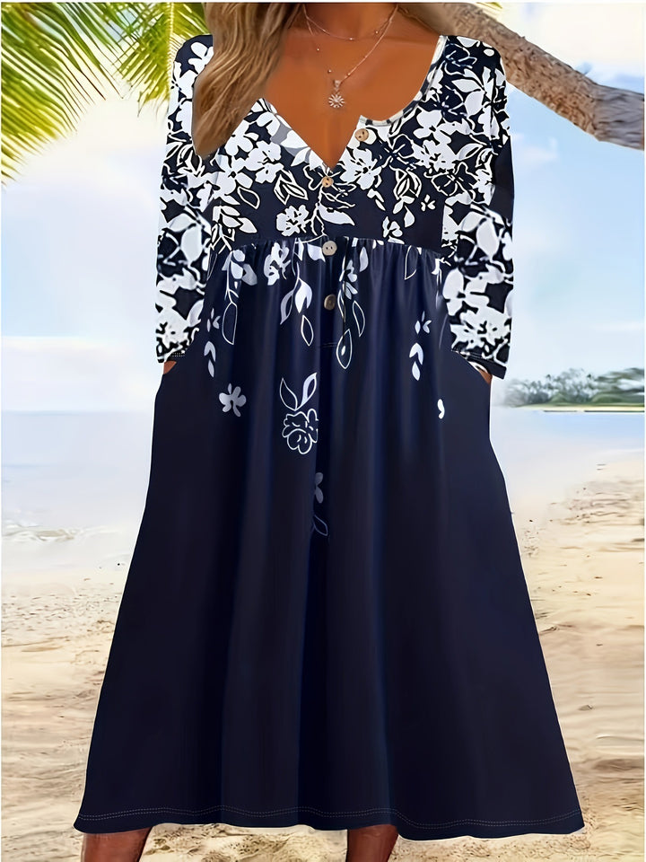 Ladies maxi dress with V-neck, floral print, button placket and side pockets Mune Fashion