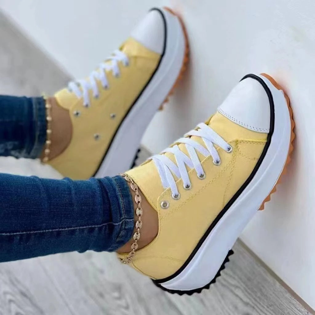 Women’s canvas platform sneaker with robust tread sole, toe cap, and lacing Mune Fashion