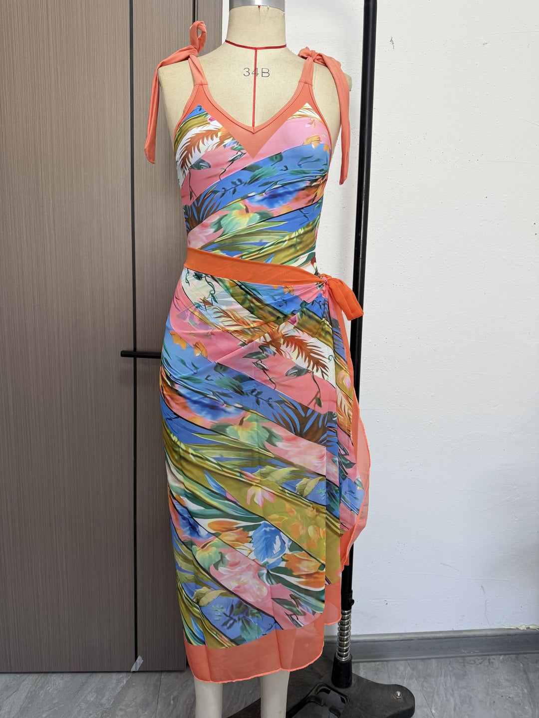 Women’s One-Piece Swimsuit with Playful Tie Straps and Elegant Wrap Skirt Mune Fashion