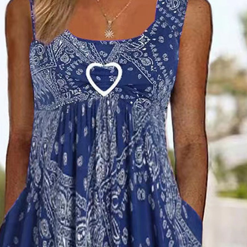 Women's airy maxi dress with paisley bandana print, gathered empire waist and practical side pockets Mune Fashion