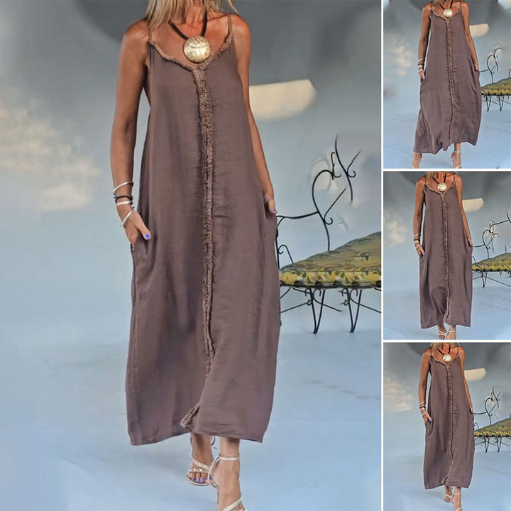 Women's airy linen-look maxi strap dress with fringed center seam and inset pockets Mune Fashion
