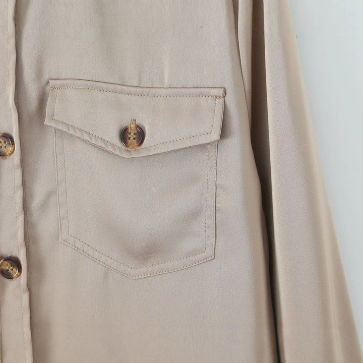 Women's oversized shirt blouse with applied breast pockets and shoulder epaulettes Mune Fashion