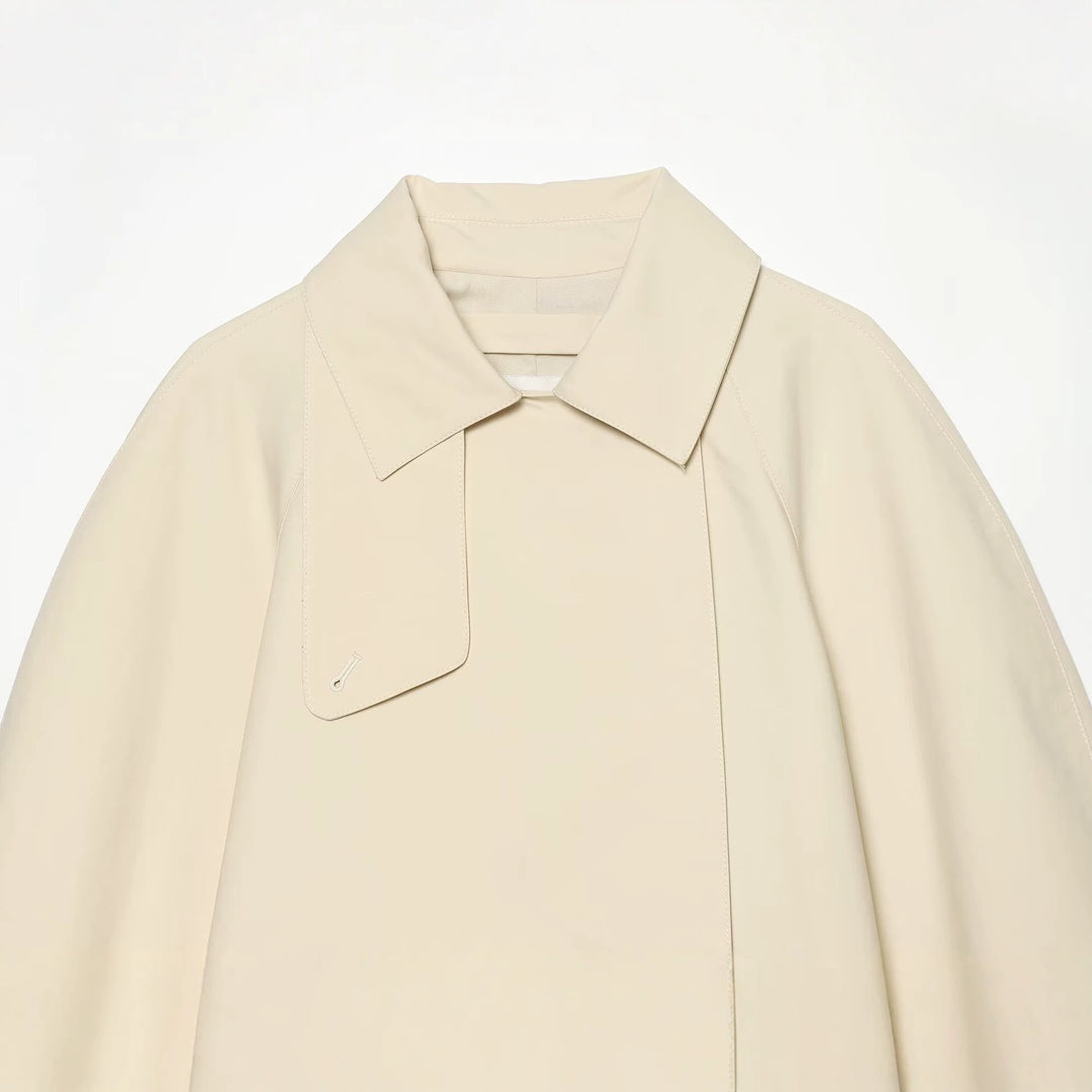 Women's short trench coat with oversized sleeves and concealed button placket Drune