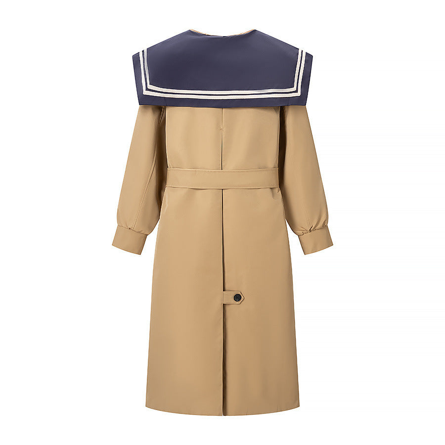 Women's trench coat with oversized sailor collar, waist belt, and concealed button placket Mune Fashion