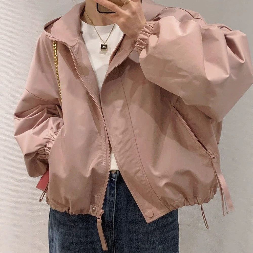 Women's oversized bomber-style hooded jacket with drawstring, elastic cuffs, and side zip pockets Mune Fashion