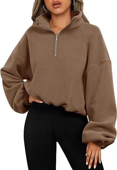 Women's cropped half-zip sweatshirt with high standing collar, balloon sleeves and elastic hem Mune Fashion