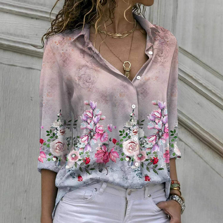 Women’s floral V-neck button blouse with loose fit and rolled sleeves Mune Fashion